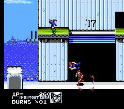 Stage 1 at the warehouse doors: Burns fights soldiers on the ground while more enemies jump down from the upper walkway. The HUD stays fixed at the bottom of the screen.